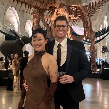Max and Weiling in front of the dinosaur skeleton at the Field Museum
